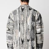 Cardigan jacquard grigio in lana merino extrafine fin.12 LTD ED