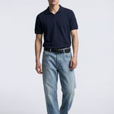 Maglia polo uomo manica corta in cotone crêpe senza bottoni, leggera e traspirante